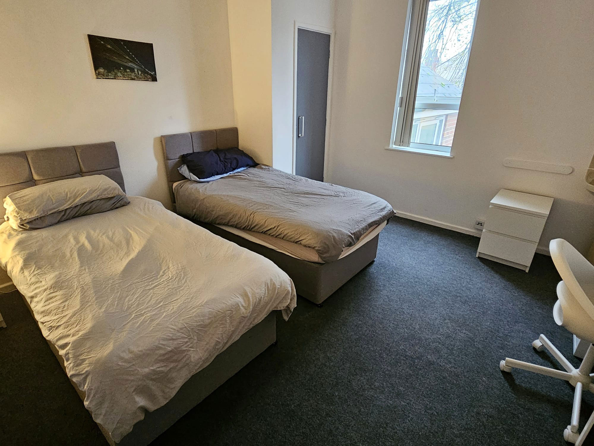 A room with two single beds.