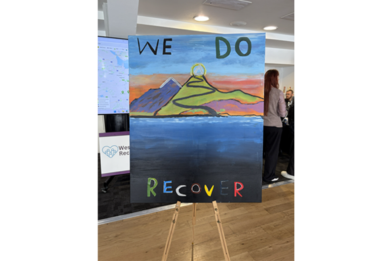 A painting of the countryside with the words We Do Recover on it