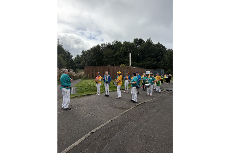 A band stood in formation outside