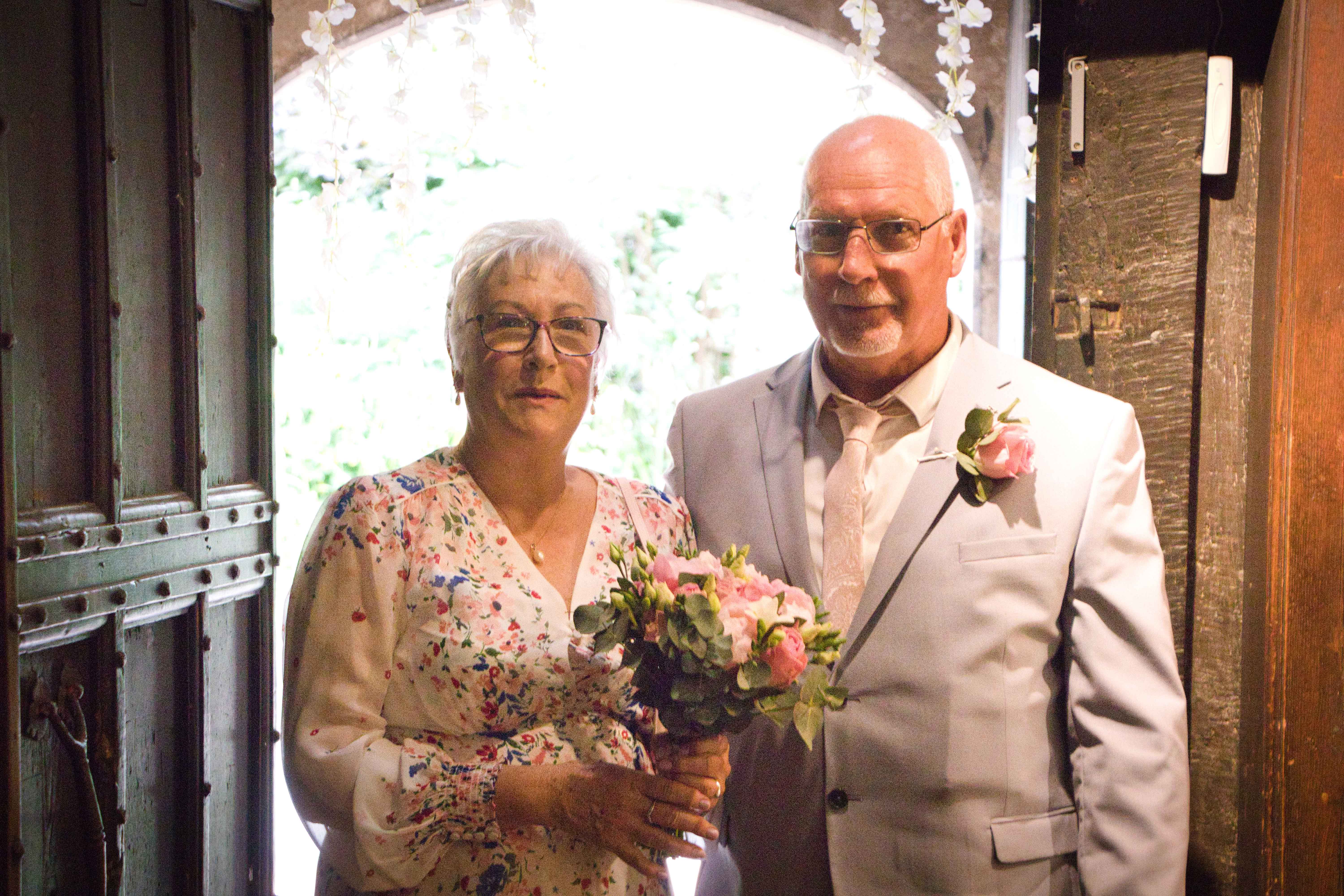 A wedding photo of an older couple.