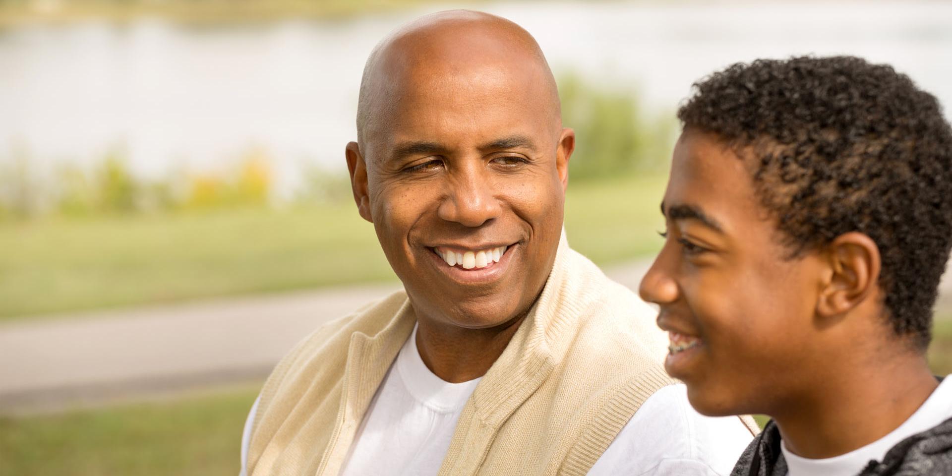 A man and a boy in the park