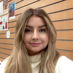 A photo of Chloe smiling 