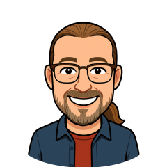 A bitmoji of Alastair. His hair is pulled back into a ponytail and he's wearing glasses