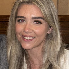 Robyn has long blonde hair