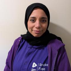 Fatima wears a black headscarf