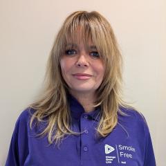 Tanya has blonde hair and a full fringe