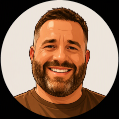 A cartoon image of Ben, he has a short beard and Moustache and is wearing a brown t-shirt