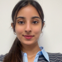 Bhumika has long dark hair
