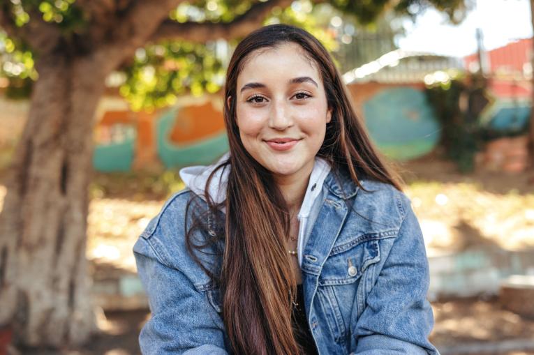 A girl stood in a park