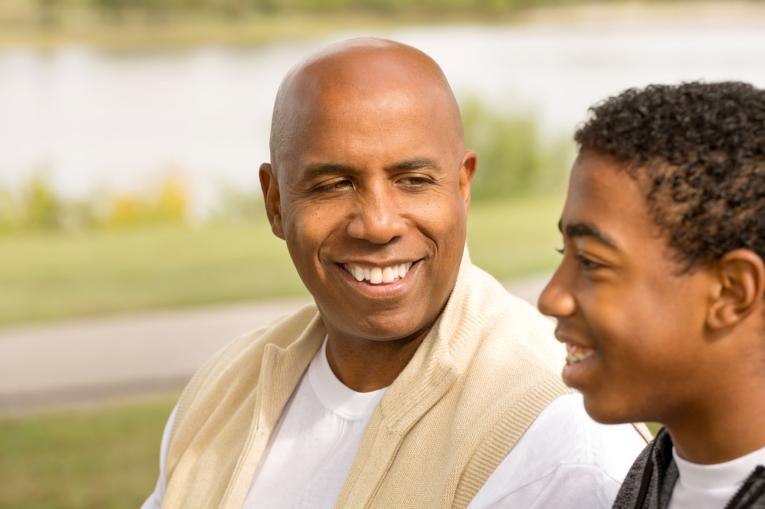 A man and a boy in the park