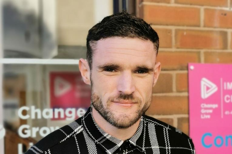 A photo of a man stood outside one of the hubs in Gloucestershire