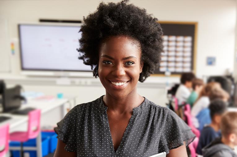 A women stood in a classroom