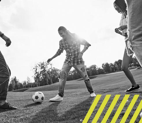 Young people playing football