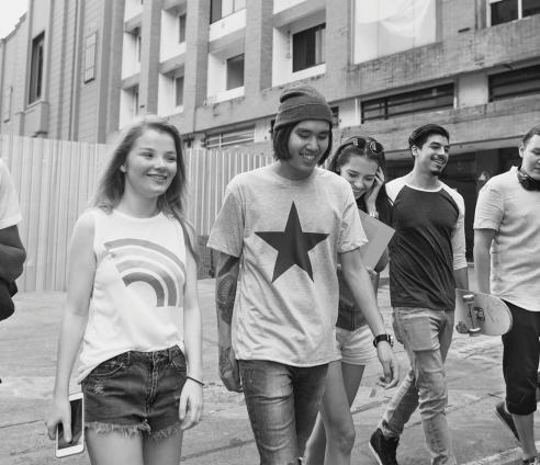 Group of young people walking together