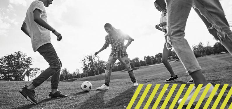 Young people playing football