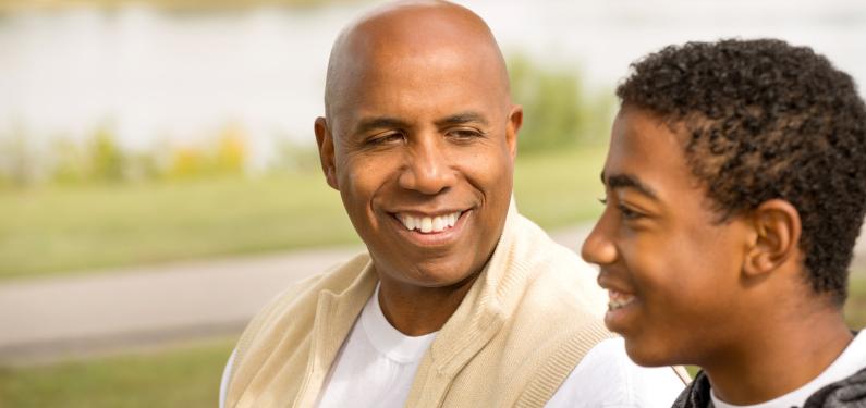 A man and a boy in the park