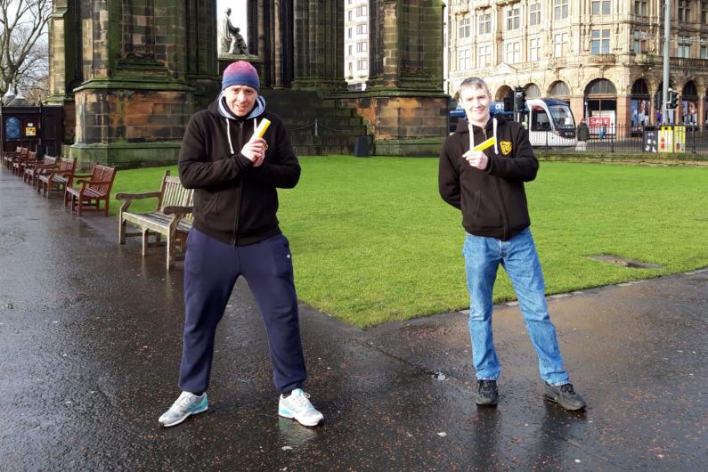 Two people in Edinburgh holding naloxone