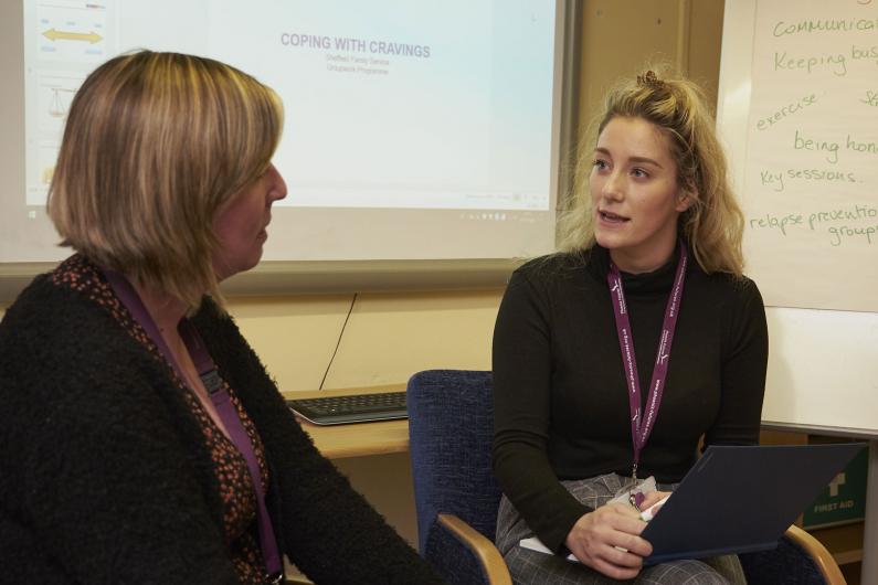 People chatting at Phoenix Futures National Specialist Family Service 