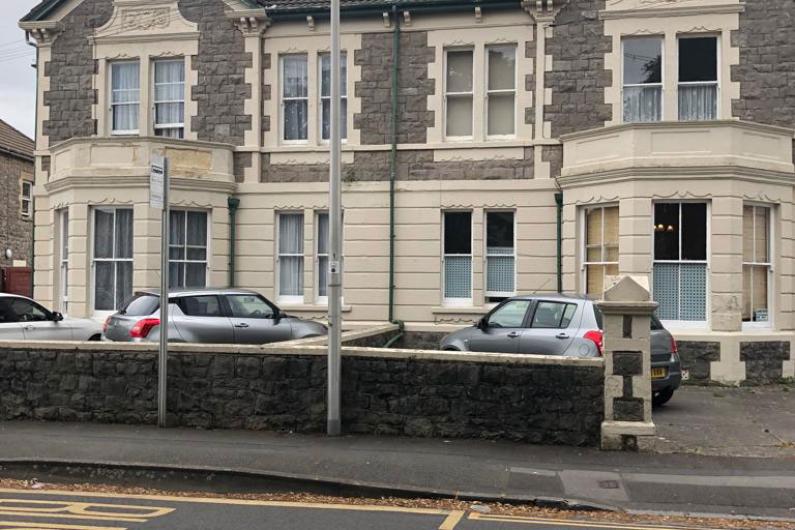 Western Counselling - Front of the building. A large grey building